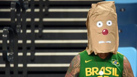 A fan of Brazil wears a makeshift mask while waiting to watch the men's Group B basketball match between Argentina and Brazil.