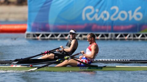 Mahe Drysdale of New Zealand, left, and Damir Martin of Croatia compete in the men's single sculls final. It was a photo finish -- both rowers clocked in with a time of 6 minutes 41.34 seconds -- but defending champion Drysdale was awarded the gold.