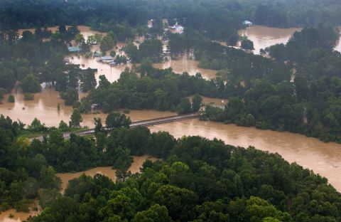 The Tangipahoa River overflows near the towns of Amite, Independence, Tickfaw and Robert on August 13.