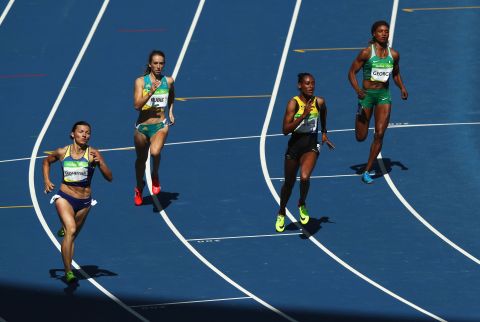 From left to right, Yuliya Olishevska of Ukraine, Anneliese Rubie of Australia, Stephenie Ann McPherson of Jamaica and Patience Okon George of Nigeria compete in a 400-meter heat.