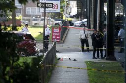 Sandals remain on a New York sidewalk near the scene of the fatal shooting Saturday of Imam Maulama Akonjee and his assistant. 