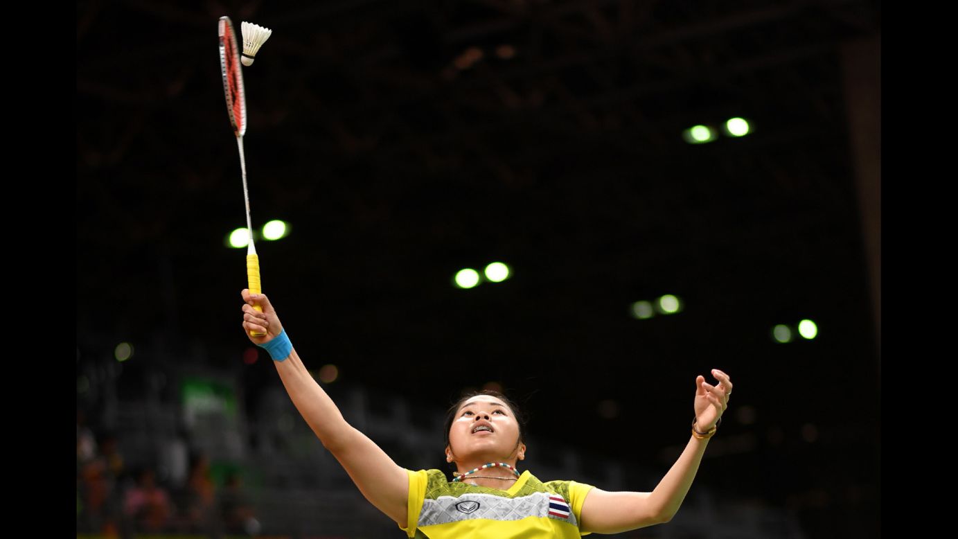 Thailand's Ratchanok Intanon returns the birdie to Hong Kong's Yip Pui Yin during their women's singles qualifying badminton match.