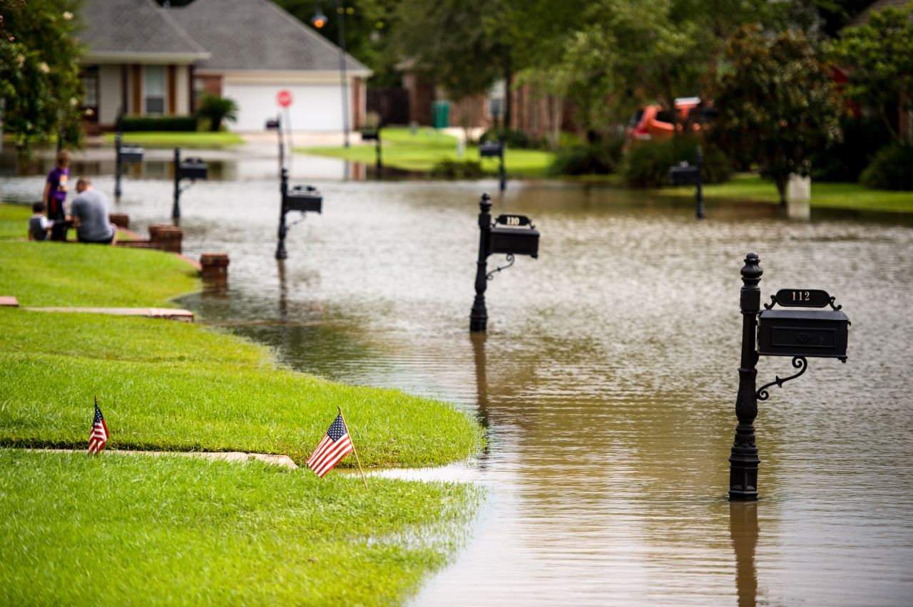 Floodwaters inundate a street in Youngsville on August 14.