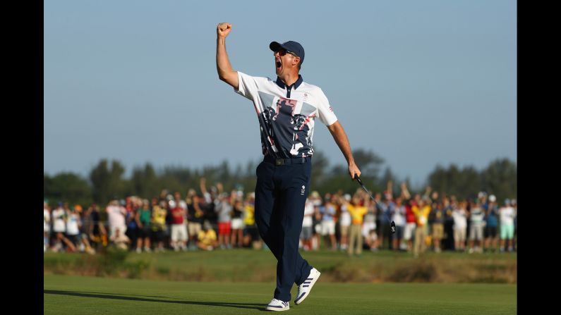 Justin Rose of Great Britain celebrates after <a  target="_blank">winning in the final round of men's golf.</a>