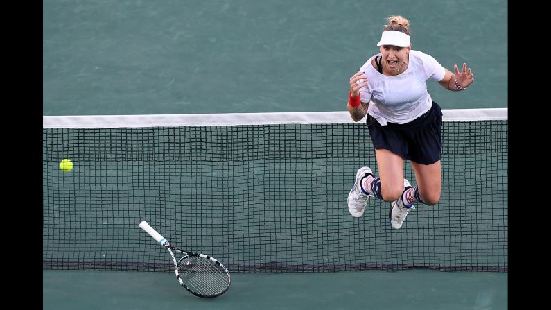 American tennis player Bethanie Mattek-Sands celebrates after she and teammate Jack Sock beat compatriots Venus Williams and Rajeev Ram in their mixed doubles gold medal tennis match.