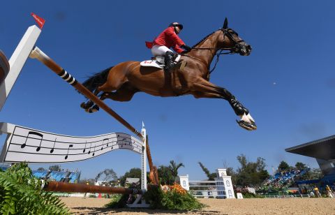 Canada's Eric Lamaze on Fine Lady competes during the equestrian's show jumping first qualifier event.