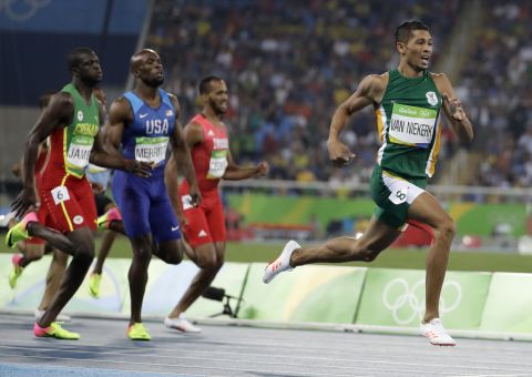 South Africa's Wayde van Niekerk takes the lead in the men's 400-meter final.  He went on to claim the gold and set a new world record. 