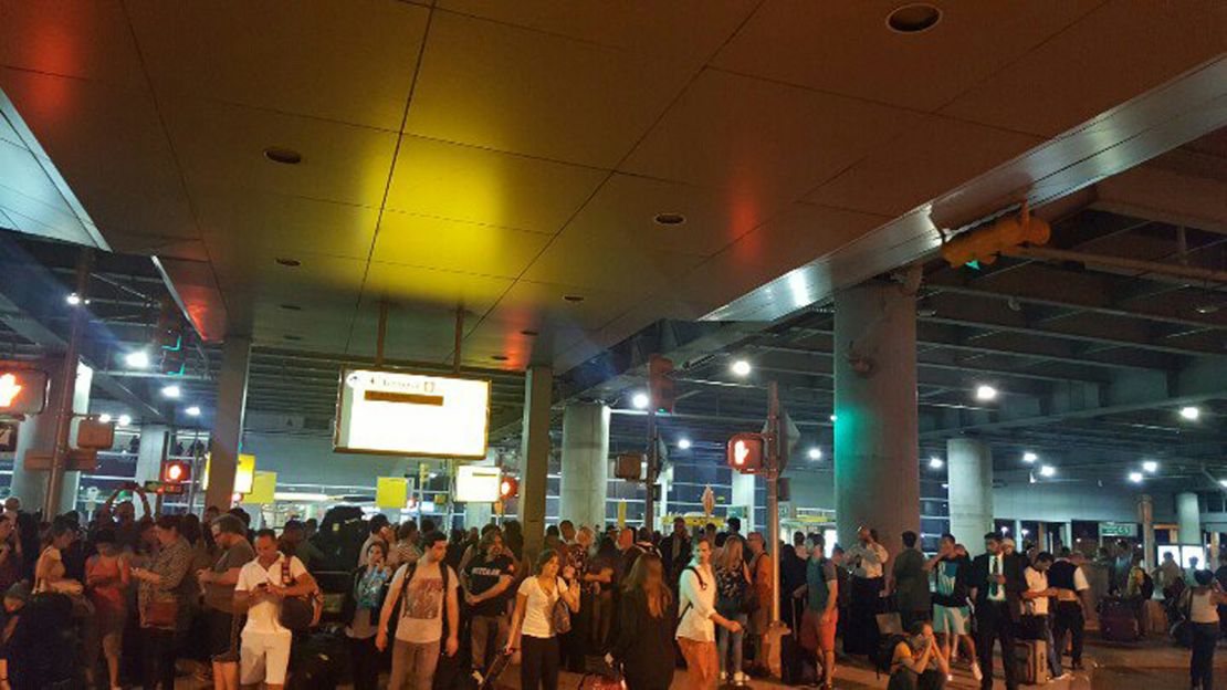 Passengers are evacuated from Terminal 8 at John F. Kennedy International Aiport.