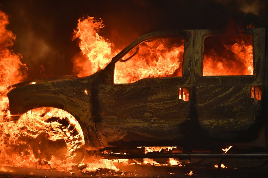A truck burns on Main Street in the town of Lower Lake, California.