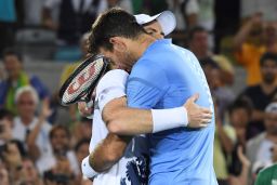 Argentina's Juan Martin Del Potro congratulates Britain's Andy Murray on winning the men's singles 
