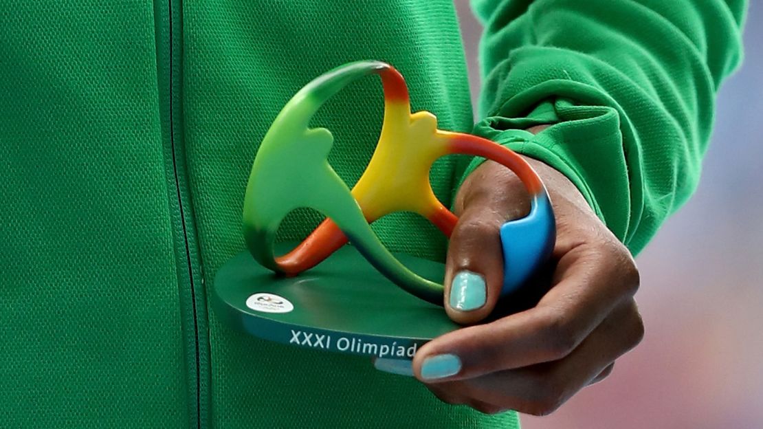 The figurine, as held by gold medalist Almaz Ayana of Ethiopia. 
