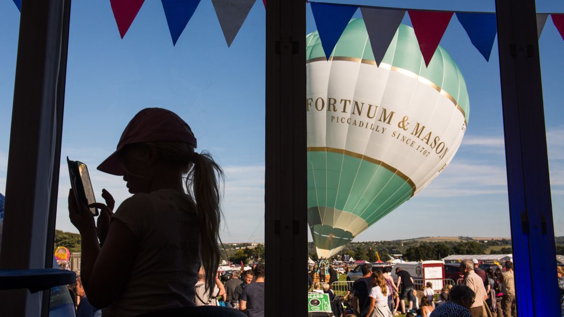 This balloon, from London grocery store Fortnum & Mason, was the first to lift off during a mass ascent Saturday. A total of 71 balloons took off that evening.