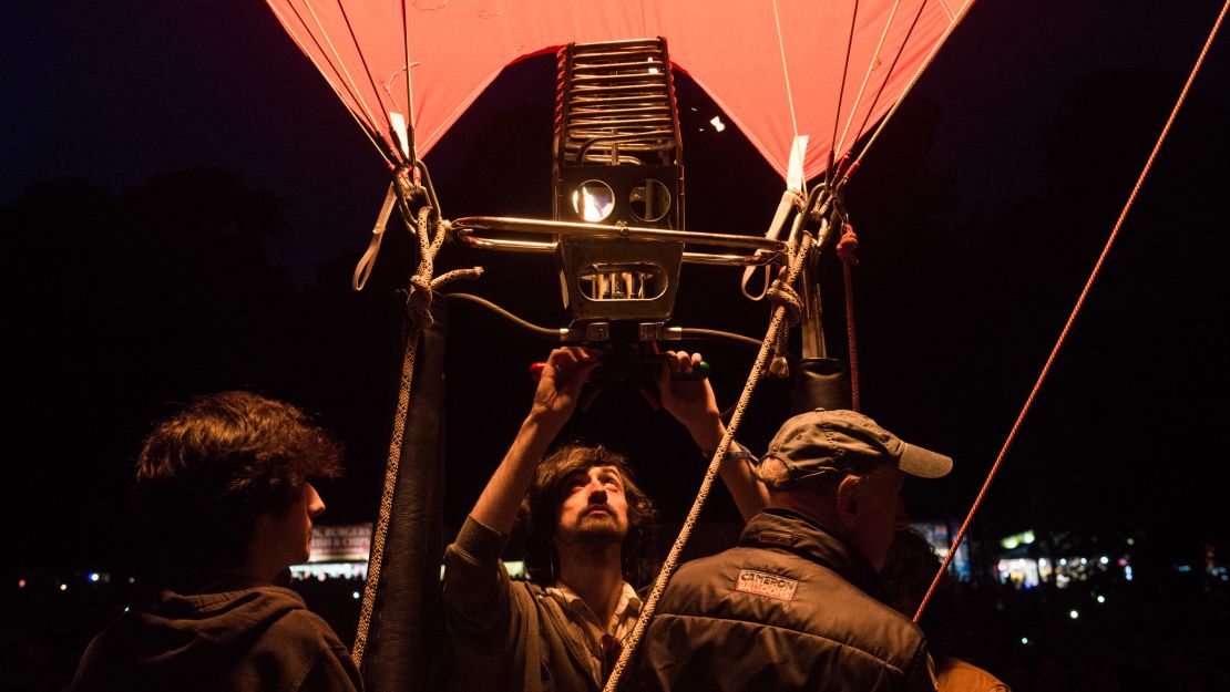 Crew members from Cameron Balloons participate in the Night Glow. The Bristol-based company is the largest manufacturer of hot air balloons in the world.