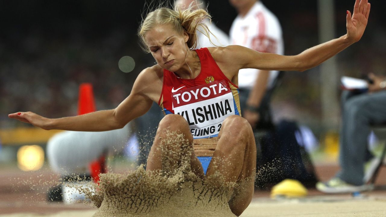 Russia's Darya Klishina competes in the final of the women's long jump athletics event at the 2015 IAAF World Championships at the "Bird's Nest" National Stadium in Beijing on August 28, 2015.  AFP PHOTO / ADRIAN DENNIS        (Photo credit should read ADRIAN DENNIS/AFP/Getty Images)