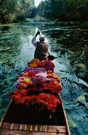 Flower Seller at Dal Lake by Steve McCurry 