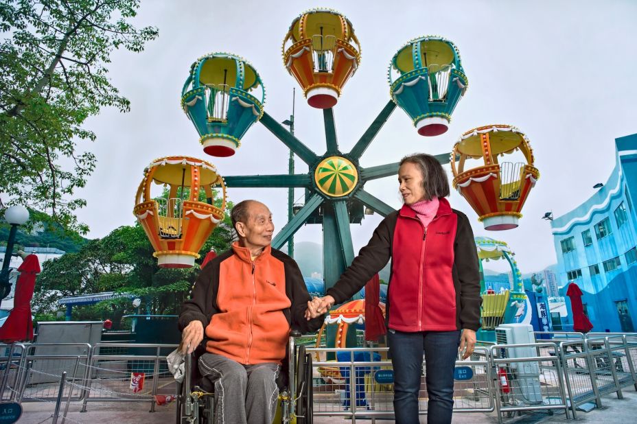 In this moving series, Dick Lau asked bedridden elderly patients where they would go if they could explore the world again. He then printed large-scale  backdrops and staged family trips in front of them, right inside the hospital. "They are in the last stages of life. For them, money or success no longer matter, just how much more time they can have with their family," says Lau.
