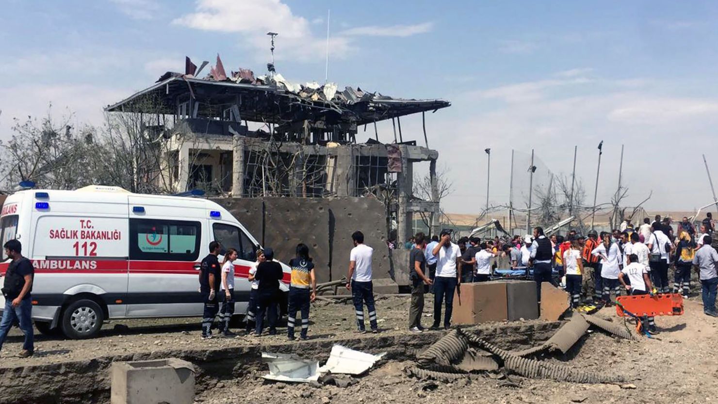 An ambulance arrives at the scene of a vehicle bombing Monday near Diyarbakir, Turkey.