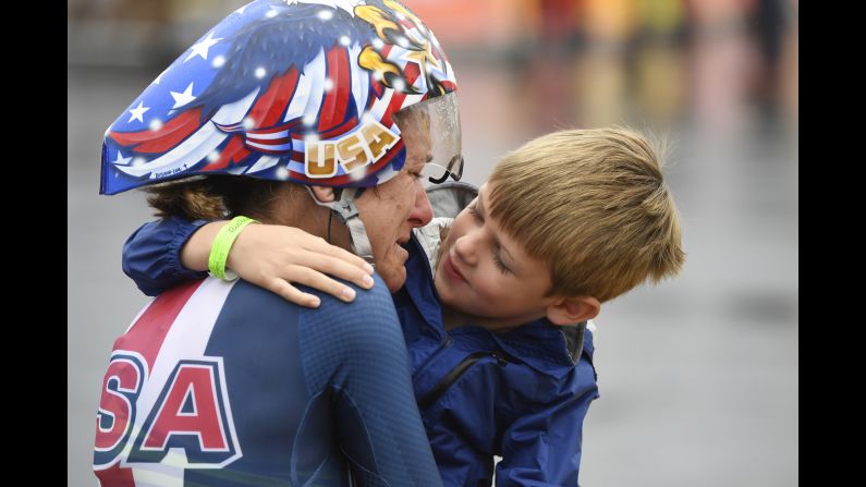 American cyclist Kristin Armstrong hugs her son, Lucas, after <a href="index.php?page=&url=http%3A%2F%2Fwww.cnn.com%2F2016%2F08%2F10%2Fsport%2Fkristin-armstrong-cycling-usa%2Findex.html" target="_blank">winning the time trial</a> for the third straight Olympics on Wednesday, August 10. Williams won gold at the event a day before turning 43 years old. She was the oldest woman in the field by seven years.