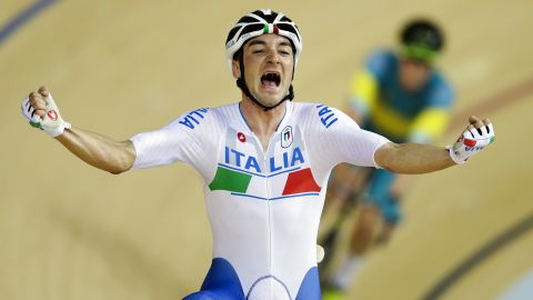Italy's Elia Viviani celebrates after winning gold in the omnium track cycling event.
