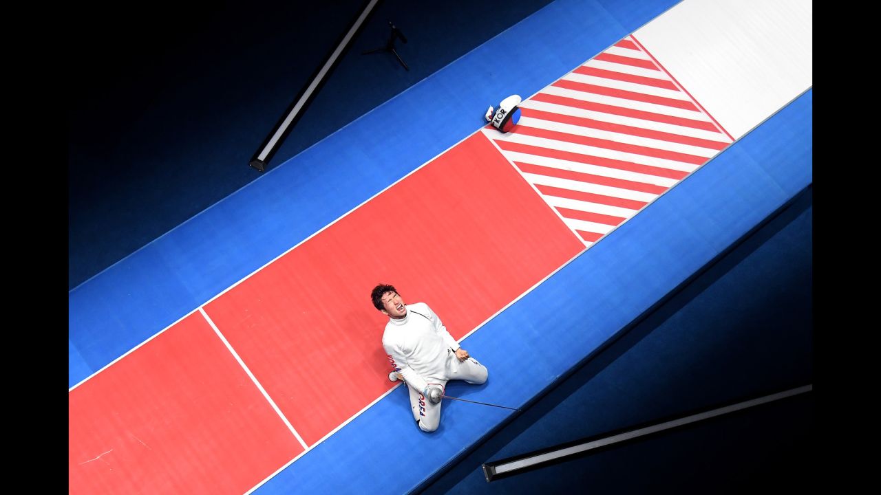 South Korean fencer Park Sang-young celebrates after he won gold in the individual epee competition on Tuesday, August 9.