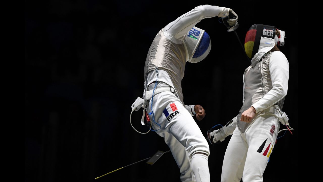 A cell phone<a href="http://www.cnn.com/2016/08/09/sport/french-fencer-drops-phone/" target="_blank"> falls out of the pocket of French fencer Enzo Lefort</a> as he competes against Germany's Peter Joppich on Sunday, August 7.