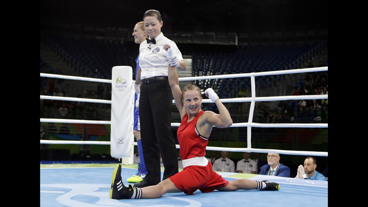 Ukrainian boxer Tetyana Kob celebrates after she won a flyweight bout on Friday, August 12.