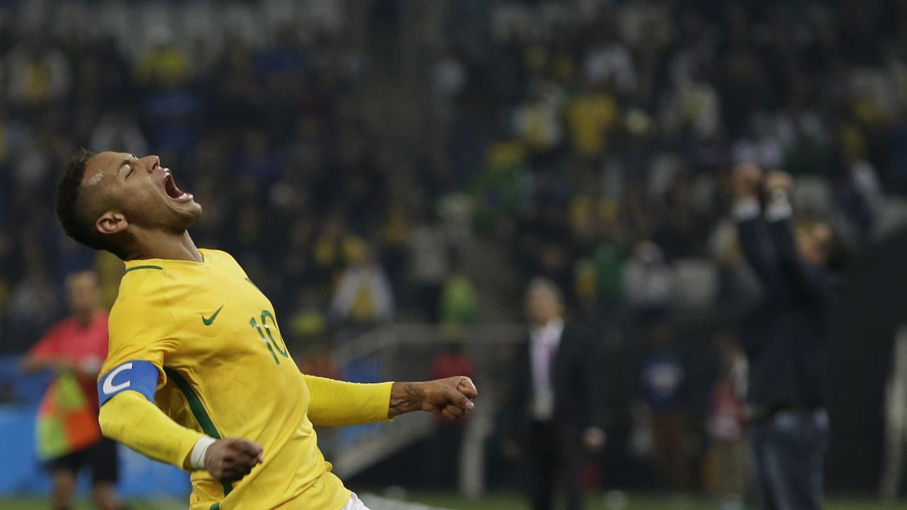 Brazilian soccer star Neymar celebrates after a quarterfinal victory over Colombia on Saturday, August 13. He scored the first goal of the match, which ended 2-0.