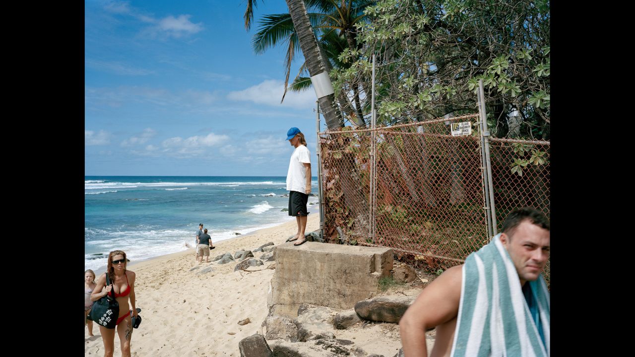 People visit a beach on Oahu.