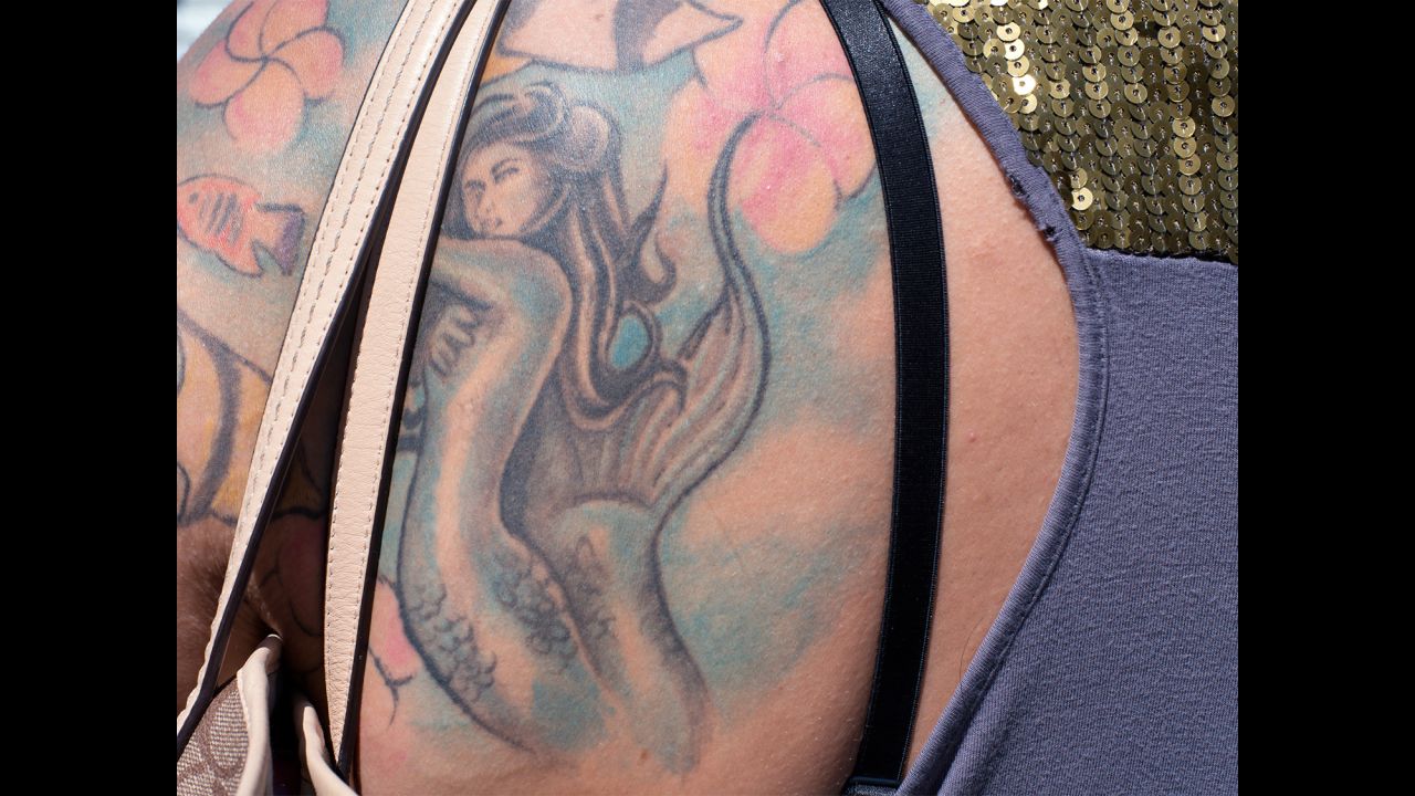 A close-up of a mermaid tattoo.
