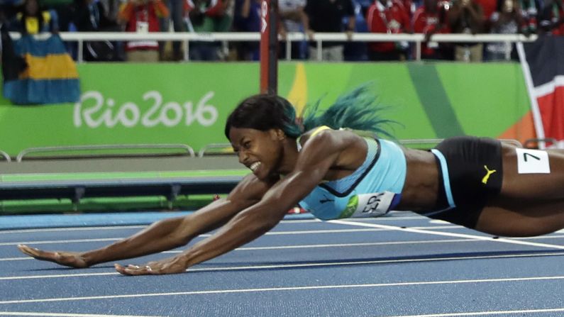 Shaunae Miller of the Bahamas <a href="index.php?page=&url=http%3A%2F%2Fedition.cnn.com%2F2016%2F08%2F15%2Fsport%2Fallyson-felix-athletics-olympics%2Findex.html" target="_blank">dives over the finish line</a> to win gold in the 400 meters on Monday, August 15. She edged American Allyson Felix by .07 seconds.