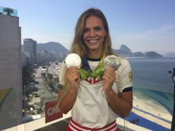 Yulia Efimova displays the silver medals she won at Rio 2016
