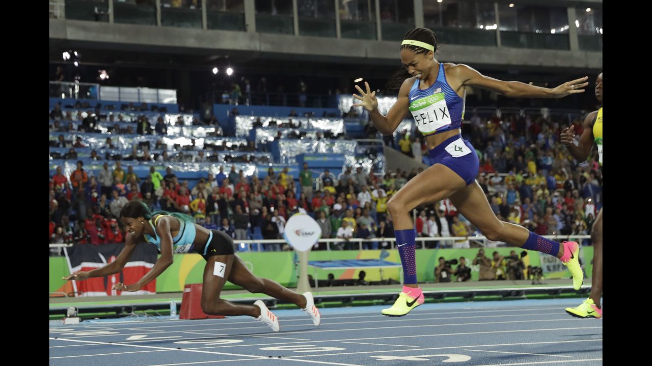 Shaunae Miller of the Bahamas <a href="http://edition.cnn.com/2016/08/15/sport/allyson-felix-athletics-olympics/index.html" target="_blank">dives over the finish line</a> to win gold in the 400 meters on Monday, August 15. She edged American Allyson Felix by .07 seconds.