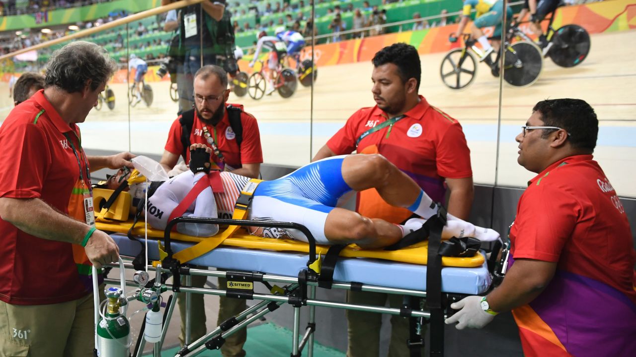 South Korea's Park Sanghoon is stretchered off after crashing during the men's omnium points race.