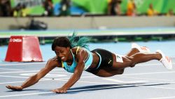 RIO DE JANEIRO, BRAZIL - AUGUST 15:  Shaunae Miller of the Bahamas dives over the finish line to win the gold medal in the Women's 400m Final on Day 10 of the Rio 2016 Olympic Games at the Olympic Stadium on August 15, 2016 in Rio de Janeiro, Brazil.  (Photo by Alexander Hassenstein/Getty Images)