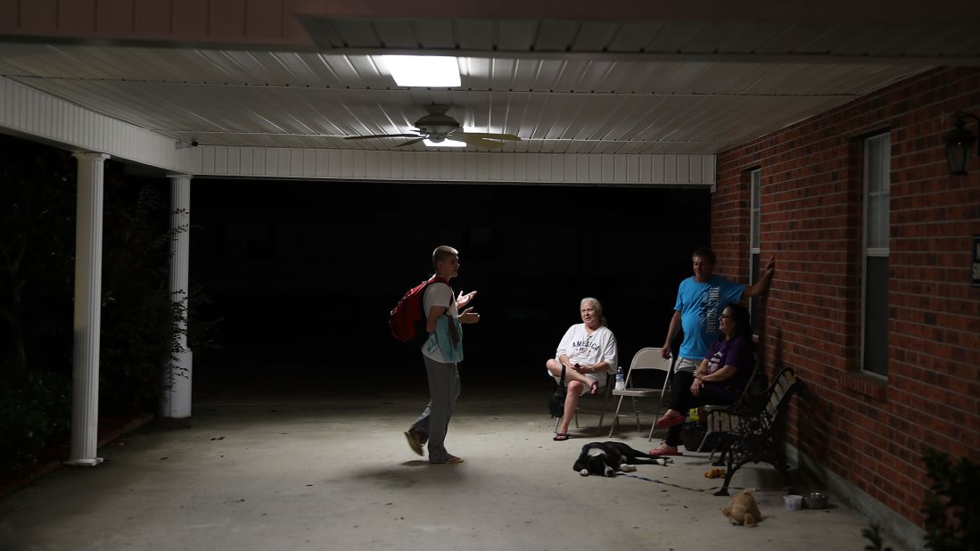 Evacuees spend time together at the church shelter in Walker on August 15.