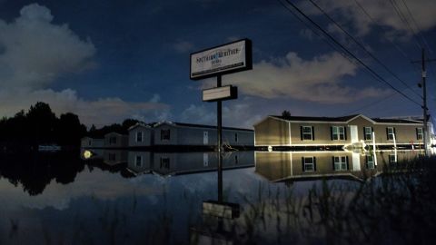 Floodwaters surround prefabricated houses in Denham Springs on August 15.