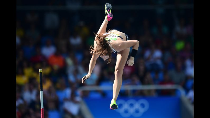 New Zealand's Eliza McCartney takes part in pole vault qualifications.