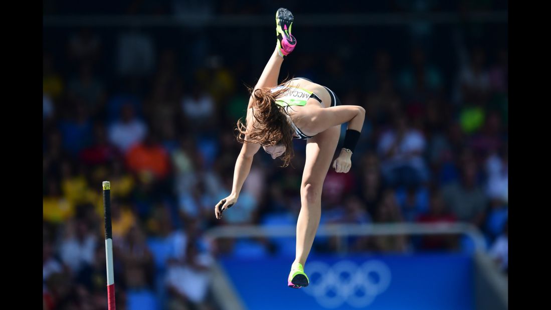 New Zealand's Eliza McCartney takes part in pole vault qualifications.