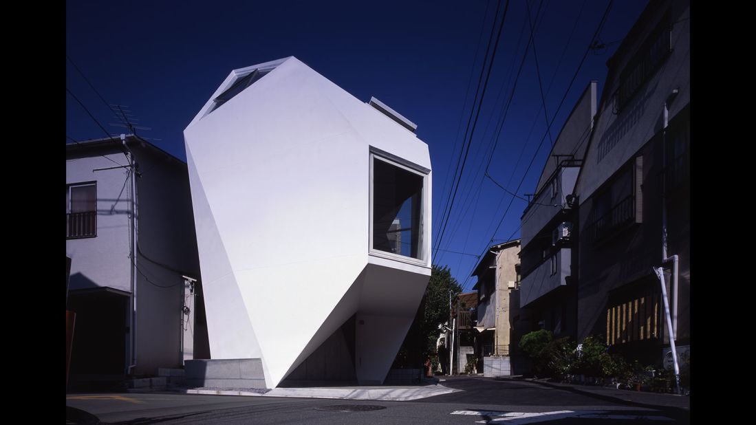 An irregularly shaped piece of land just 480 square feet, Reflection of Mineral is located in a dense area of Tokyo. To comply with building codes without sacrificing space, Atelier Tekuto designed a polyhedron shape that maximized living space and natural light. 