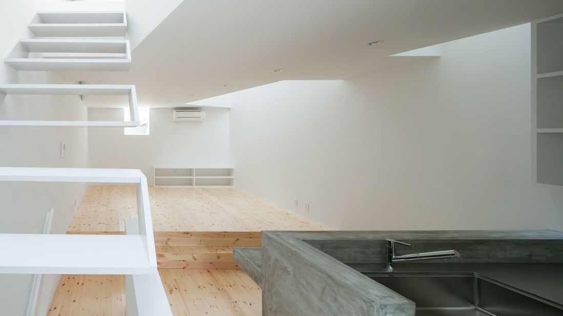 This 1,016-square-foot address is situated in Osaka and designed by Ido Kenji Architectural Studio. A home for a family of four, the architects designed the living area to be as spacious as possible. 