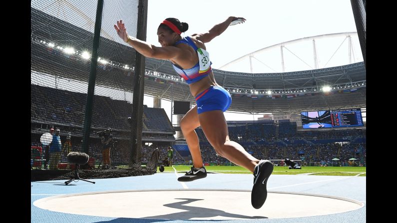 Cuba's Yaime Perez competes in the discus throw final.  