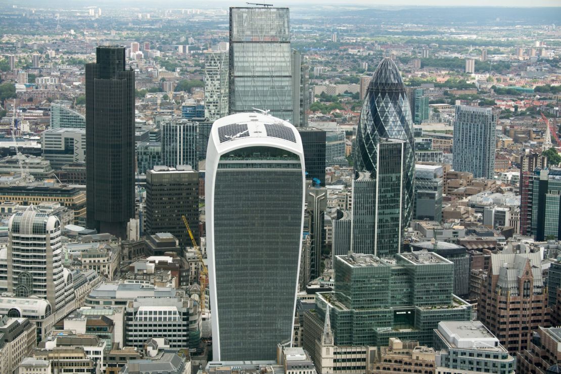 The City of London financial district skyline includes a number of unusual buildings, including the rounded Gherkin (R) and the  'Walkie Talkie' (C front), the winner of the 2015 Carbuncle Cup.