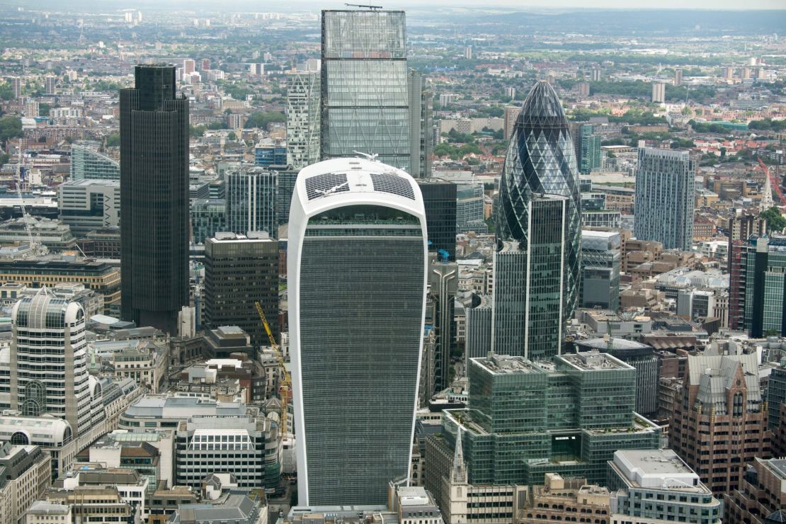 The City of London financial district skyline includes a number of unusual buildings, including the rounded Gherkin (R) and the 'Walkie Talkie' (C front), the winner of the 2015 Carbuncle Cup.