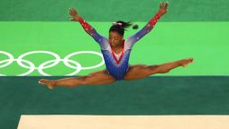 U.S. gymnast Simone Biles won a record-tying four gold medals and one bronze as she dazzled the crowd with a mix of elegance and athleticism rarely seen in the sport.  