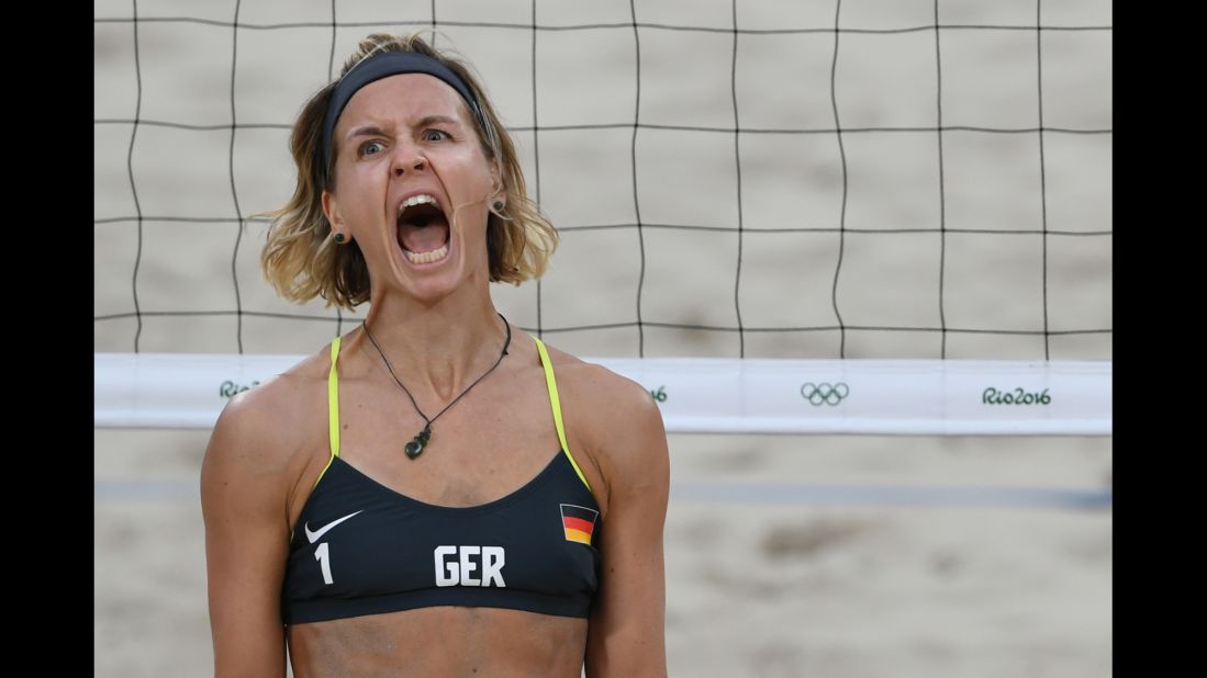 Germany's Laura Ludwig reacts during a semifinal win in beach volleyball.