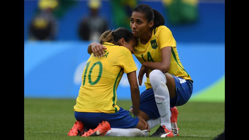 Bruna comforts her Brazilian teammate Marta after <a href="http://edition.cnn.com/2016/08/16/sport/brazil-womens-football-sweden-semifinal-olympics/index.html" target="_blank">they lost to Sweden</a> in the soccer semifinals. The match was decided on penalty kicks after a goalless draw.
