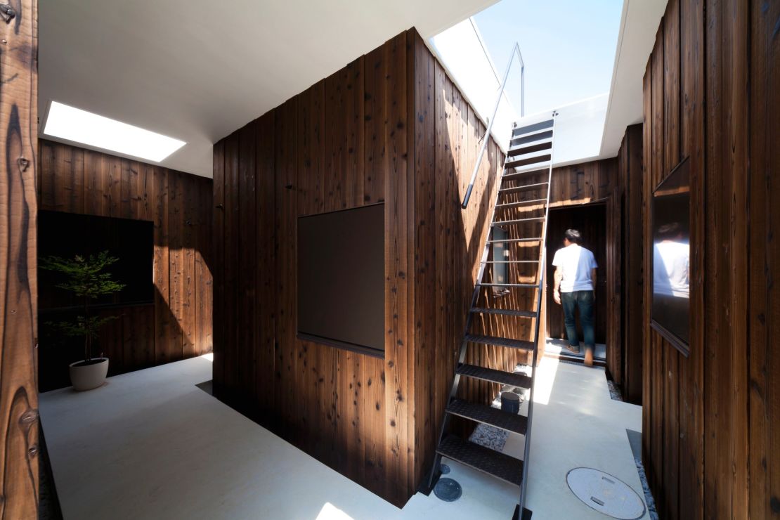 Using natural materials such as cedar wood and terrazzo floors, Atelier Tekuto created a nature-inspired abode for a Japanese family. 
