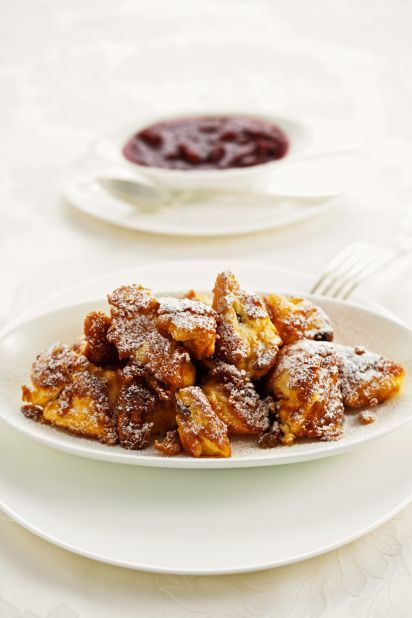 Kaiserschmarrn is a specialty dish that can sometimes be eaten as a main course in Austria. Fluffy pancakes are shredded into little pieces and drenched in a fruit sauce. Vienna's Cafe Central serves a supersize kaiserschmarrn.