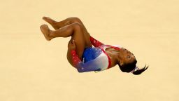 RIO DE JANEIRO, BRAZIL - AUGUST 16:  Simone Biles of the United States competes on the Women's Floor final on Day 11 of the Rio 2016 Olympic Games at the Rio Olympic Arena on August 16, 2016 in Rio de Janeiro, Brazil.  (Photo by Dean Mouhtaropoulos/Getty Images)