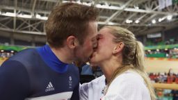 RIO DE JANEIRO, BRAZIL - AUGUST 16:  Gold medalist Jason Kenny of Great Britain celebrates with girlfriend, cycling gold medalist Laura Trott of Great Britain, after the Men's Keirin Finals race on Day 11 of the Rio 2016 Olympic Games at the Rio Olympic Velodrome on August 16, 2016 in Rio de Janeiro, Brazil.  (Photo by Bryn Lennon/Getty Images)